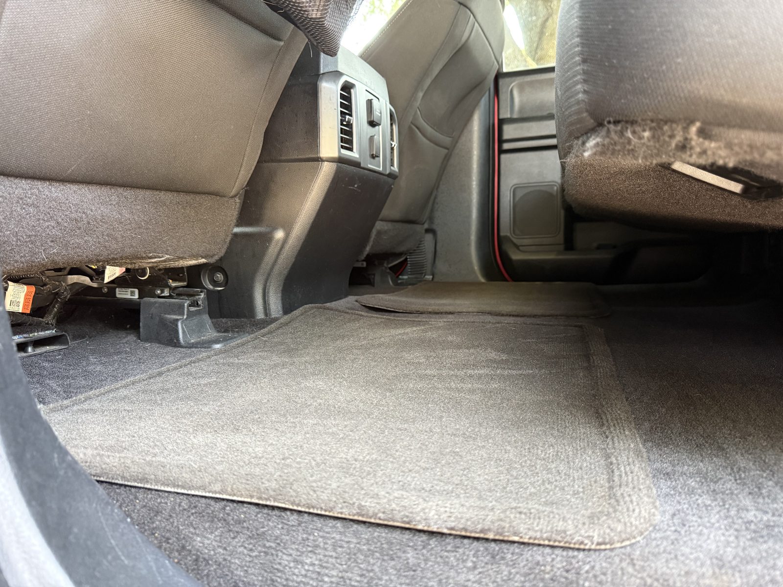 Low cabin carpet vacuumed clean after detailing